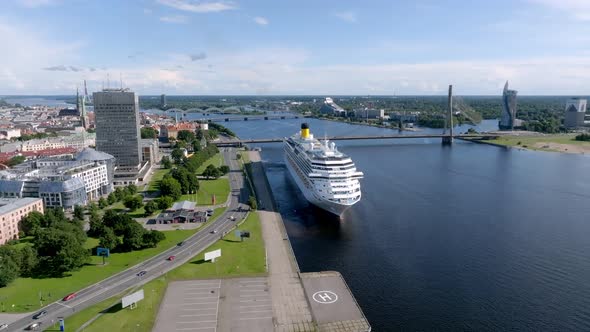 Beautiful Cruise Ship Docked in Riga Latvia Near the Old Town and the Bridge