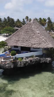 Tanzania  Vertical Video House on Stilts in the Ocean on the Coast of Zanzibar Slow Motion