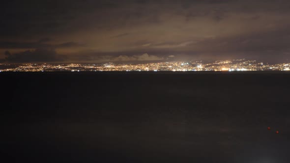 Nighttimelapse from Island Krk with view to Rijeka - Croatia