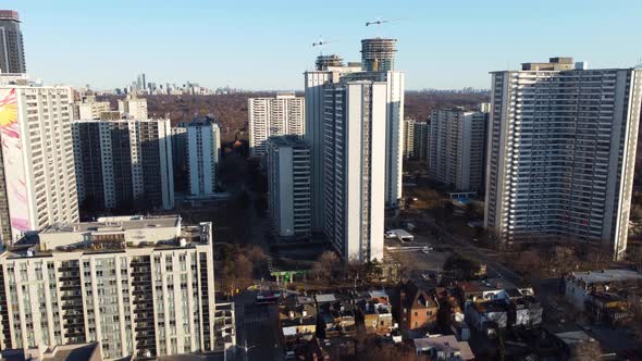 4k ascending drone shot of SJT community in downtown Toronto with a view of tall high-rise apartment