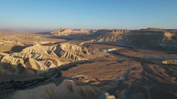 Aerial footage at Sde Boker, in Neguev desert of Israel. Dry river in the desert landscape.