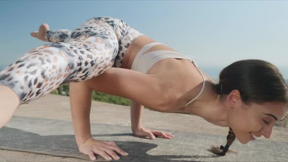 Woman Stretching Body at Viewpoint of Barcelona. Flexible Woman Doing Yoga