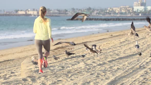 A woman running on the beach