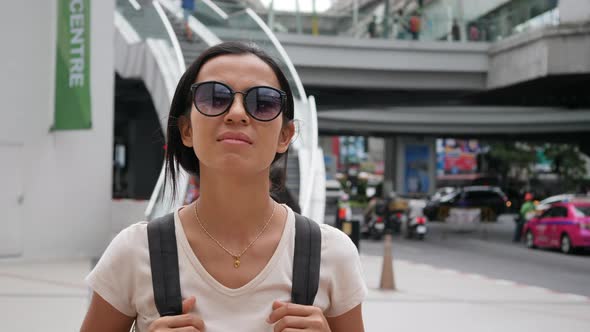 Traveler woman wearing glasses on the street