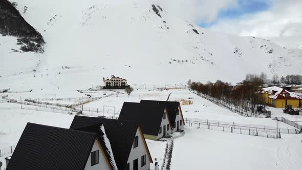 Aerial Motion of Snowy Village Houses.