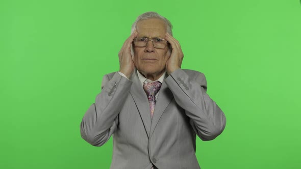 Elderly Businessman in Suit Suffer By Headache Pain Trouble. Old Senior Man