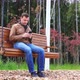 Guy Texting on Mobile Phone in Park - VideoHive Item for Sale