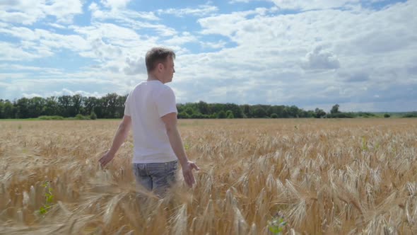 Man Farmer on Barley Field