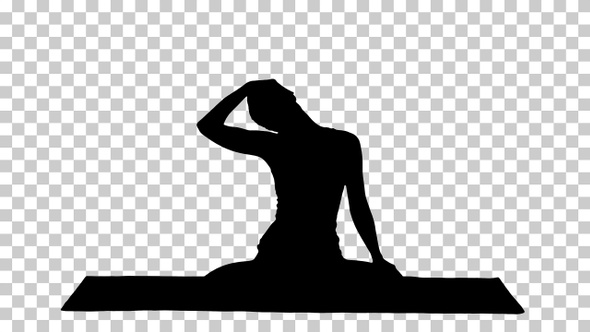 Silhouette Peaceful woman practising yoga sitting in Lotus alt