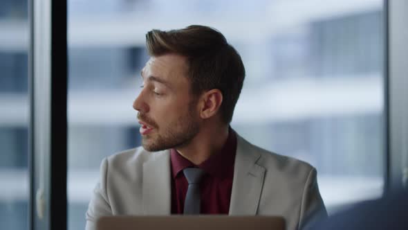 Focused Man Ceo Working Using Computer Looking Laptop Screen in Corporate Office