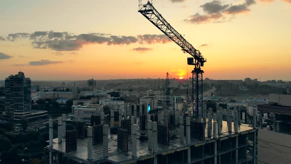 One Crane Working on Building Site, Constructing a House. alt