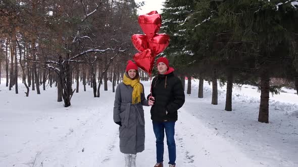 Romantic Young Hipster Couple's Love Time in Winter Park