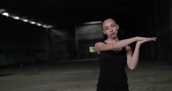 Brutal Girl Dances Freestyle at Camera in an Abandoned Building