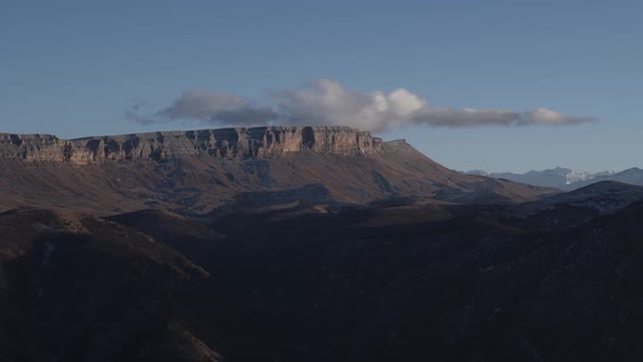 Car in the Mountains of the Caucasus in Winter