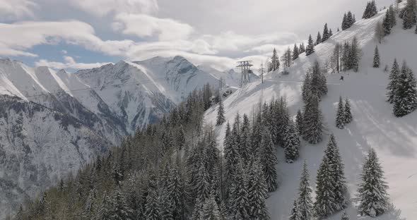 Drone In Winter Over Forest On Kitzsteinhorn Mountain