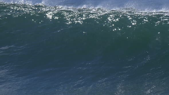 Waves break in surf line.