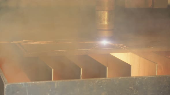 Close up of a Plasma laser cutting metal plate