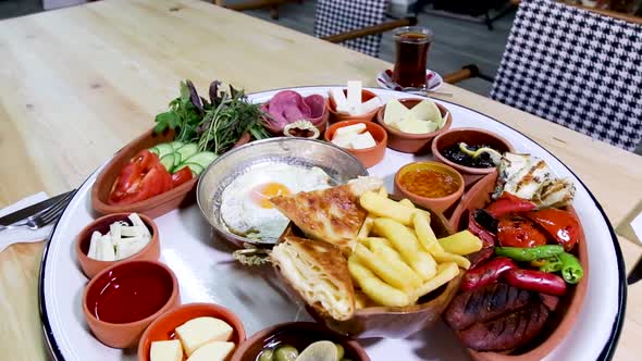 breakfast table sausage egg cheese tomato cucumber sausage - turkish