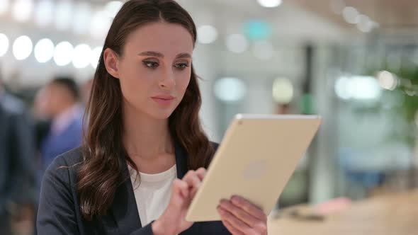 Businesswoman Using Internet on Tablet, Online Business