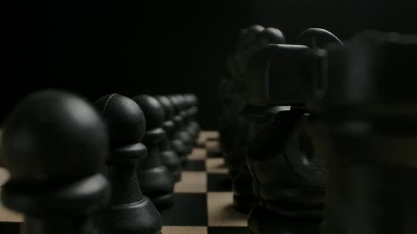 Black Chess Pieces in Start Row Position Ready to Game Concept