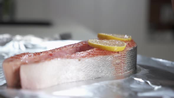 Process of Cooking the Baked Salmon Steak in Foil with Lemon