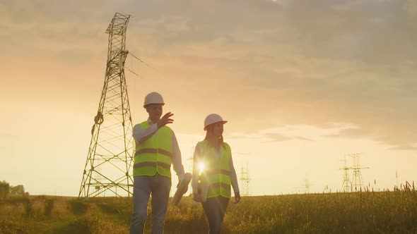 Coworking Engineers with Tablets on Solar Plant