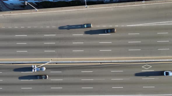 Static overhead aerial of highway traffic on sunny day in Argentina