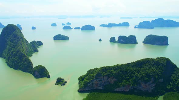 An aerial view from a drone flying over the mouth of the river at Phang Nga Bay