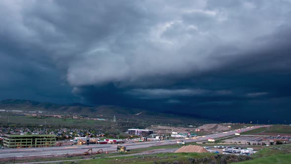 Time lapse of dark storm clouds rolling as storm moves in