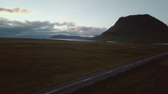 Flying the mavic pro nearby Mt. Kirkjufel in the sunset.  Slow cinematic movement in 4k