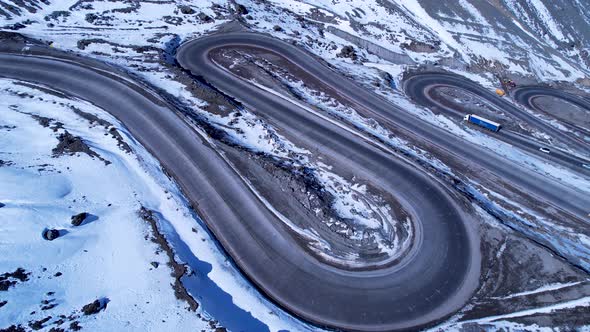 Highway road with scenic curves winding road at Andes Mountains.