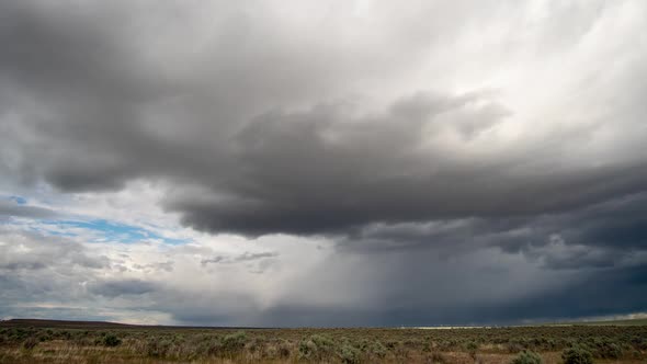 Time lapse of dark storm clouds moving over Southern Idaho