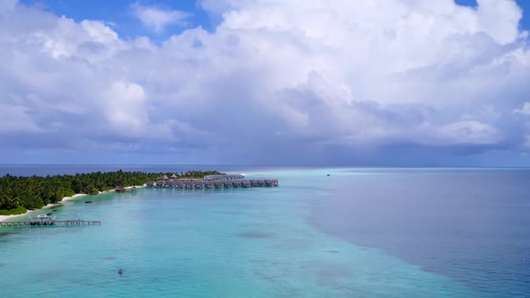 Drone view seascape of tropical island beach by lagoon and sand background