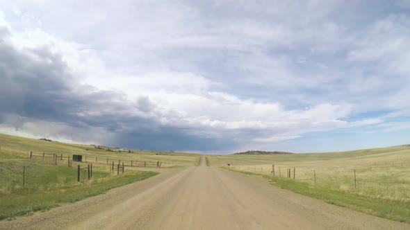 POV point of view - Driving through countryside in Eastern Colorado.