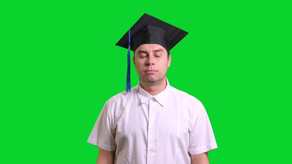 Young Male Smiling Graduate College in Black Hat Doing Thumbs Up on Chroma Key Background