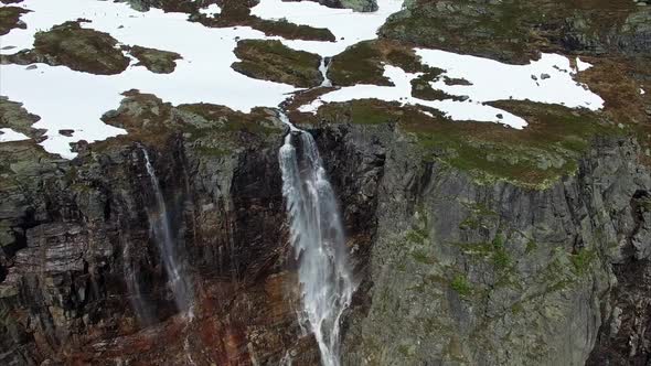 Aerial footage of picturesque tall waterfall in Norway, aerial footage