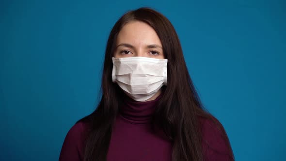 Woman Feeling Sick and Wearing Mask