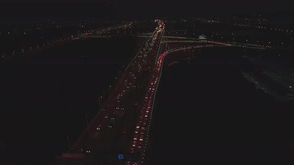 Aerial Top View of Highway Interchange at Night alt
