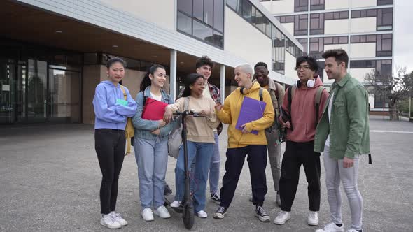 Happy University Students Together In Outdoors Campus Building