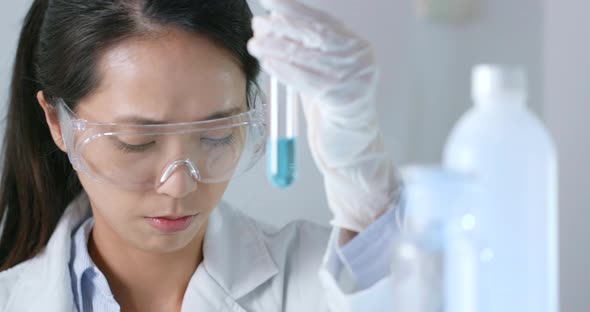 Woman Scientist Working in Laboratory