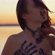 Attractive Body Painted Emotive Caucasian Female at a Salt Lake in Slow Motion - VideoHive Item for Sale