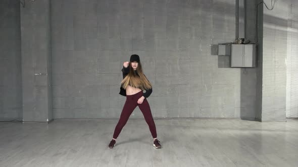 Young Slim Girl Performing Contemporary Dance in Studio