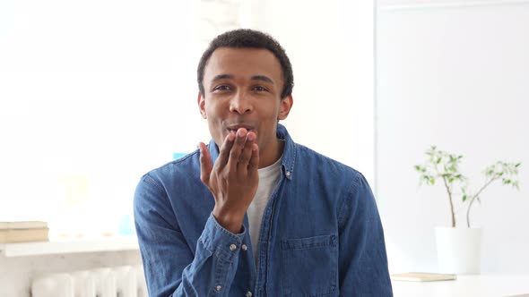 Flying Kiss by Young Afro-American Man, Portrait