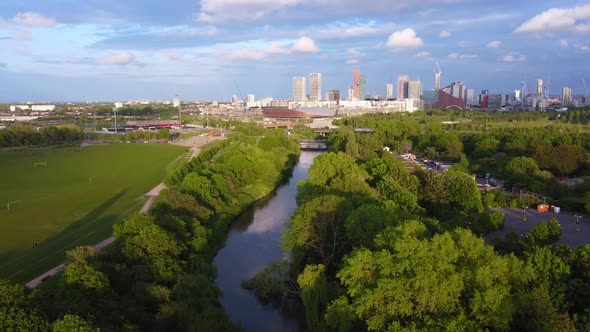 Aerial Drone View of Hackney Marshes and View of London City Skyline