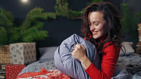 Beautiful smiling woman model. Fashion portrait of model girl indoors with Christmas decorations