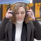 Young woman using headphones at station - VideoHive Item for Sale