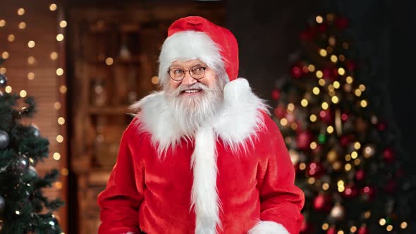 Portrait of Male Santa Claus Smiling Congratulations Merry Christmas