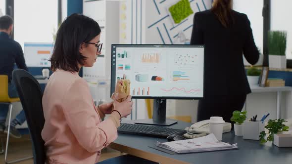 Businesswoman Having Delivery Lunch Food Order During Takeaway Lunchtime Working in Business Company