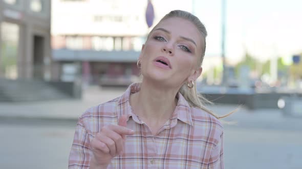 Portrait of Angry Young Woman Fighting Outdoor