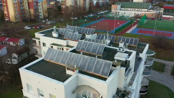 Drone Shot on Modern Multiapartment Buildings with Solar Panels on the Roofs